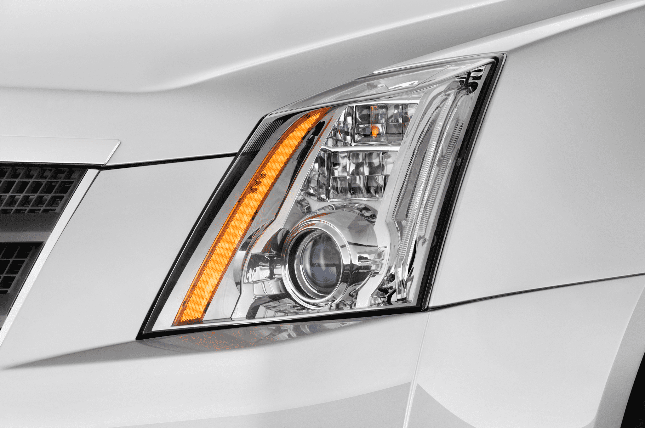 2013-cadillac-cts-premium-collection-coupe-headlight.png