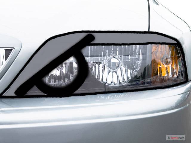 2006-lincoln-ls-4-door-sedan-v8-sport-headlight_100262720_m.jpg