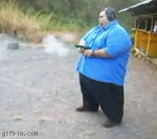 fat_guy_shooting_his_gun.gif