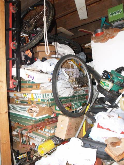 new cabinet doors stacked 5 feet high.JPG