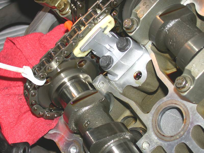 s-replacing-upper-cam-chain-tensioners-1st-2-threads-left-bank-new-metal-tensioner-rear-view-jpg.jpg