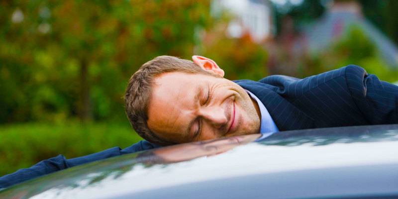 TrueCar-Steals-on-Wheels-120229-0308-man-hugging-car1.jpg