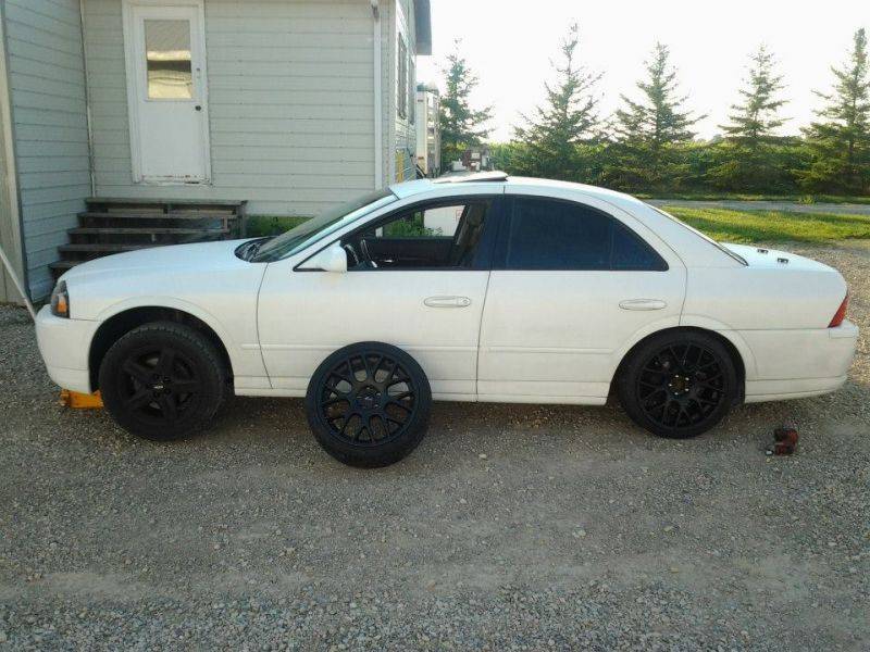 wheels going on.jpg