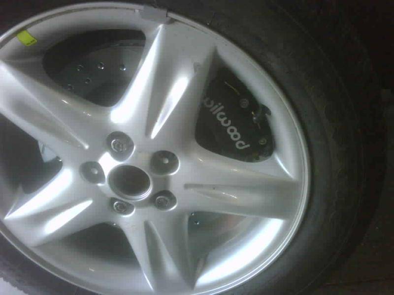 Wilwood with stock rims.jpg