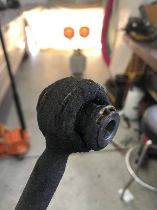 Worn tie rod end.JPG