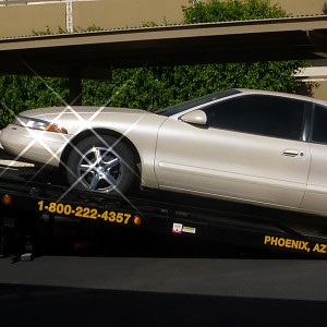 Pearl being loaded on tow truck.jpg