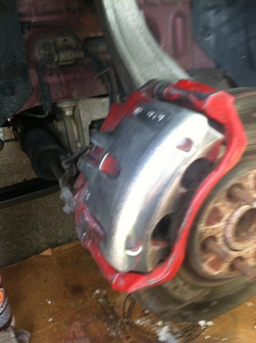 polishing off the red calipers.jpg