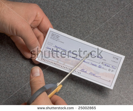 stock-photo-a-mortgage-payment-check-being-cut-in-half-the-check-is-entirely-original-artwork-an.jpg