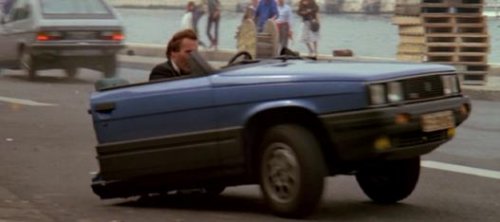 a-view-to-kill-bond-drives-a-half-car_528_poster.jpg