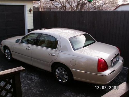 2000 Deville & 2003 Lincoln Town Car (Cartier)